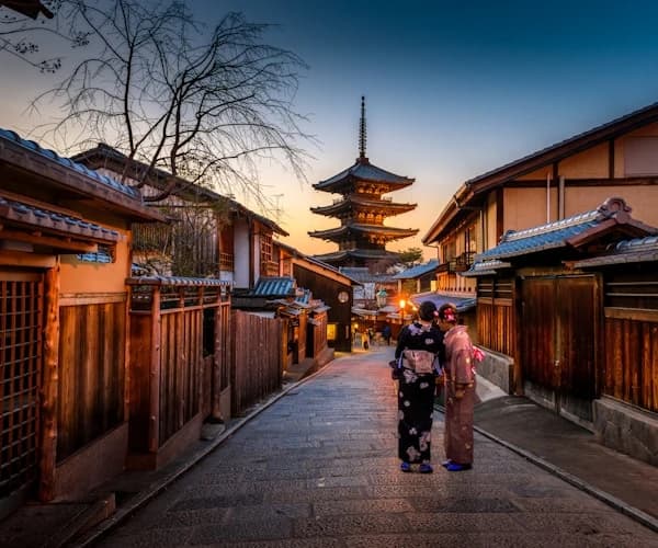 Kyoto street at dusk near a pagoda
